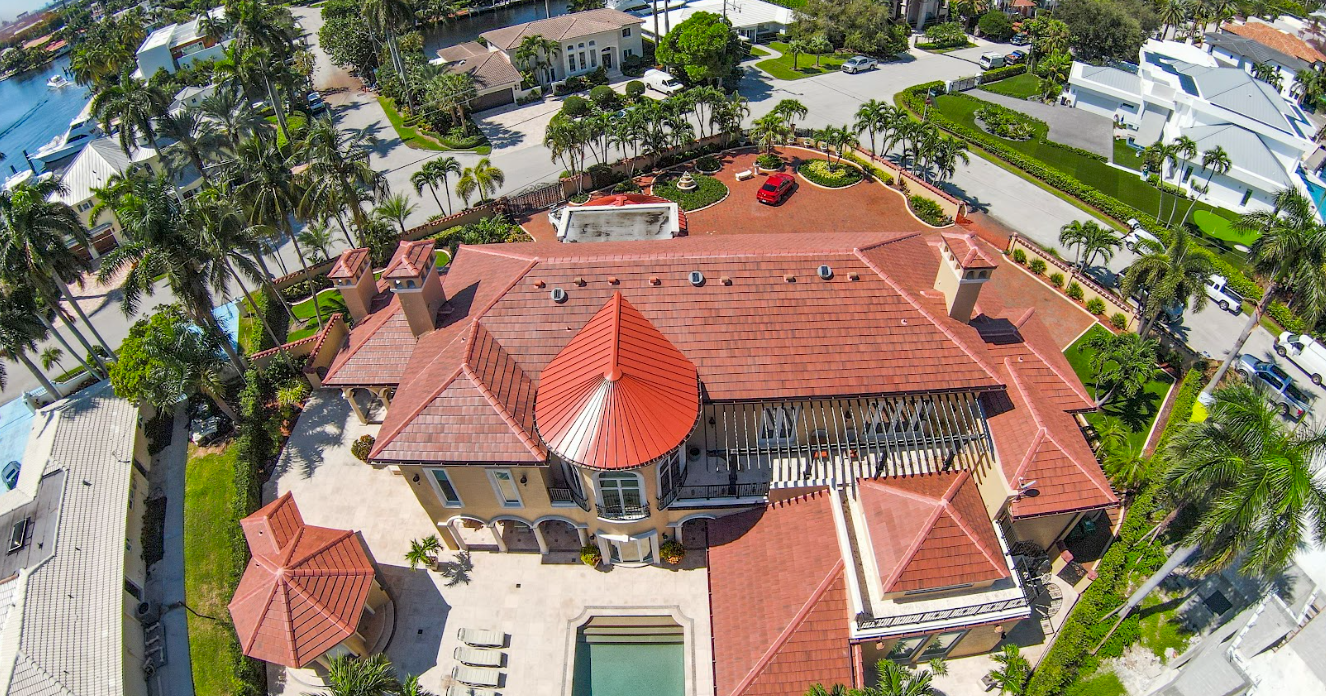Roofing contractor inspecting a roof